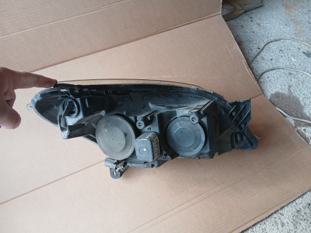 10016 Opel H astra 2004-2014 Lámpa , Fényszóró Használt sima Bal első 