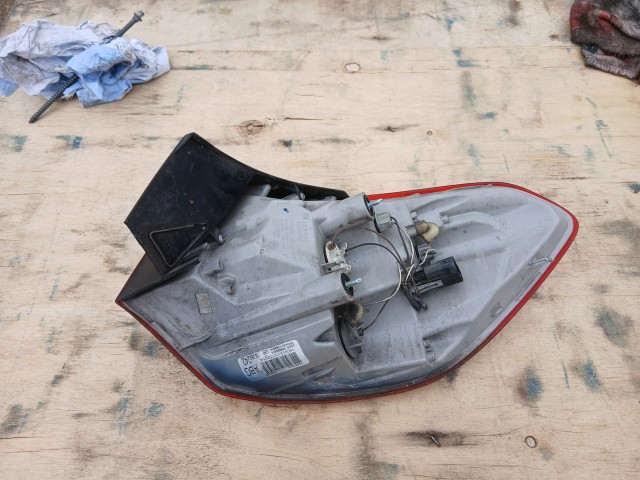 10010 Opel Astra J 2009-2015 Lámpa , Fényszóró Használt Bal hátsó külső