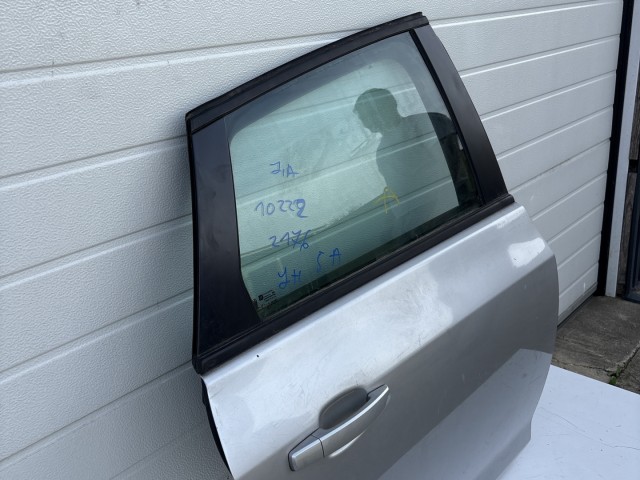 10222 Opel Astra J 2009-2015 Ajtó Használt Jobb hátsó Szürke Z176