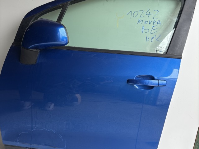 10242 Opel Mokka 2012 Ajtó Használt Bal első Kék sérült 