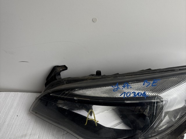 10304 Opel Astra J 2009-2015 Lámpa , Fényszóró Használt Bal első 