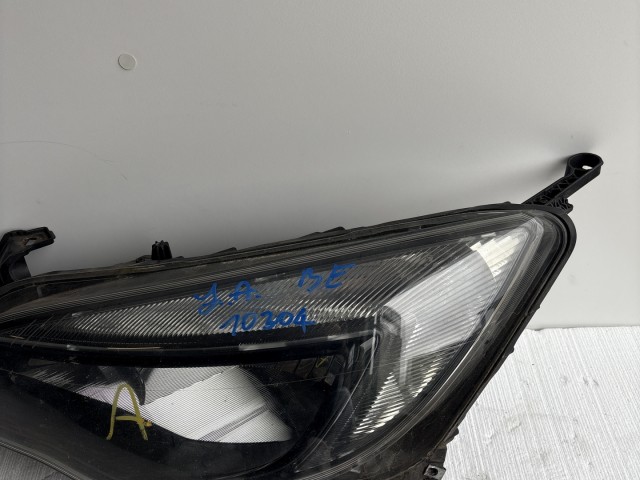 10304 Opel Astra J 2009-2015 Lámpa , Fényszóró Használt Bal első 