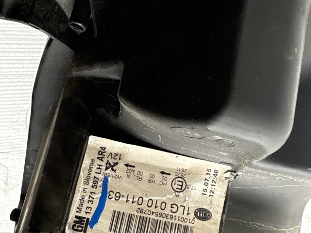 10304 Opel Astra J 2009-2015 Lámpa , Fényszóró Használt Bal első 