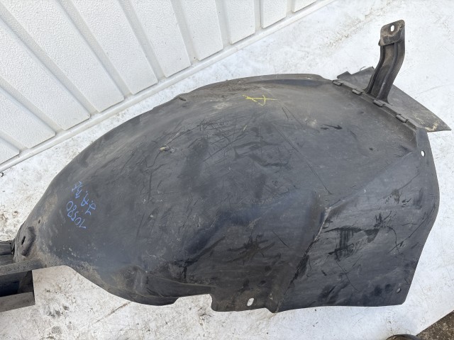 Opel Astra J 2009-2015 Kerékjárati dobbetét Használt bal első 