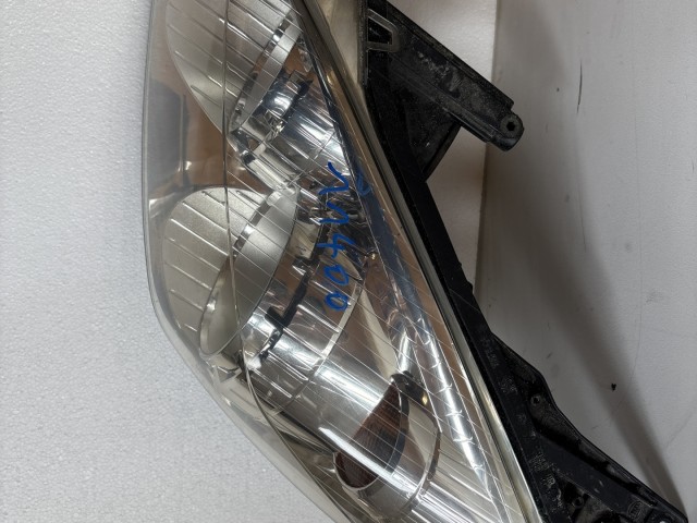 11400 Opel Astra H 2004-2010 2004-2010 Lámpa , Fényszóró Használt sima Bal első 