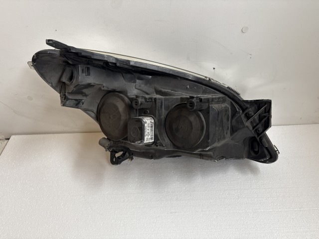11400 Opel Astra H 2004-2010 2004-2010 Lámpa , Fényszóró Használt sima Bal első 
