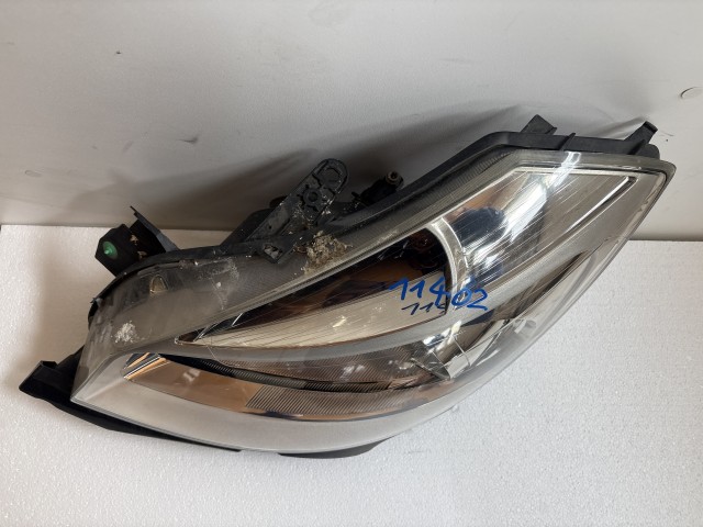 11402 Renault Clio III. 2007-2014 Lámpa , Fényszóró Használt sima Bal első 