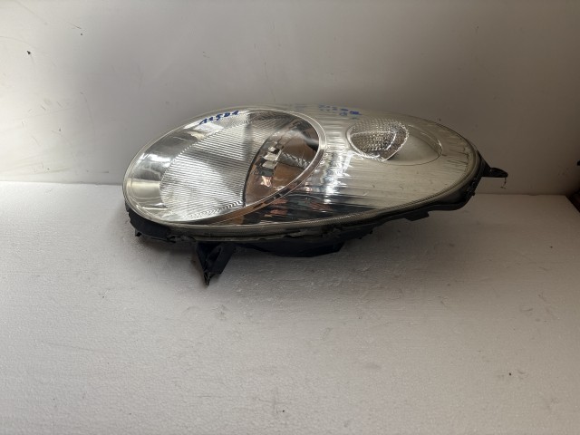 11501 Nissan Micra III. 2003-2010 Lámpa , Fényszóró Használt Bal első 
