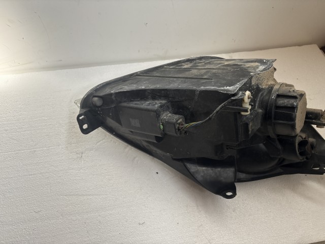 11510 Ford Fiesta v 2004-2008 Lámpa , Fényszóró Használt Bal első 