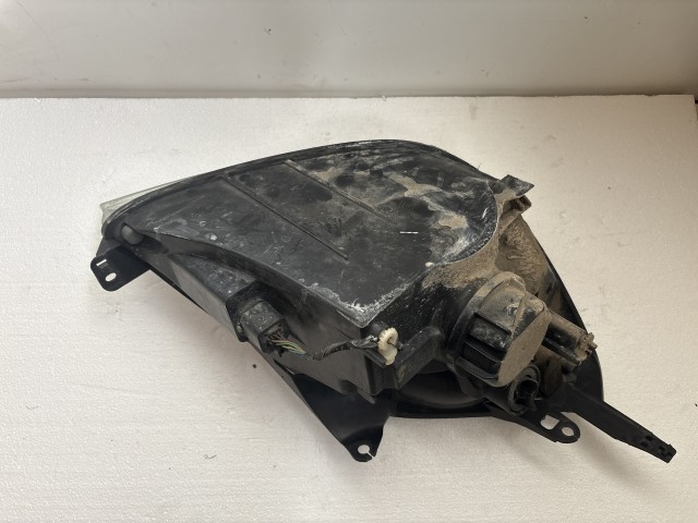 11510 Ford Fiesta v 2004-2008 Lámpa , Fényszóró Használt Bal első 