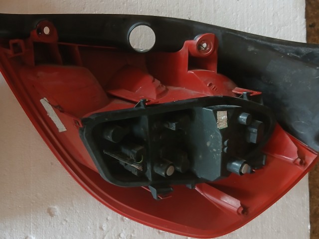 12059 Renault Clio III. 2007-2014 Lámpa , Fényszóró Használt Bal hátsó