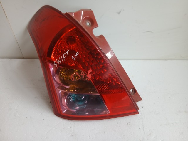 6946 Suzuki Swift III. 2005-2010 Lámpa , Fényszóró Használt Bal hátsó