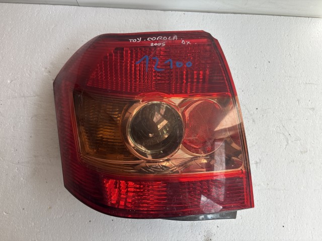 12100 Toyota Corolla 2001-2007 Lámpa , Fényszóró Használt Bal hátsó